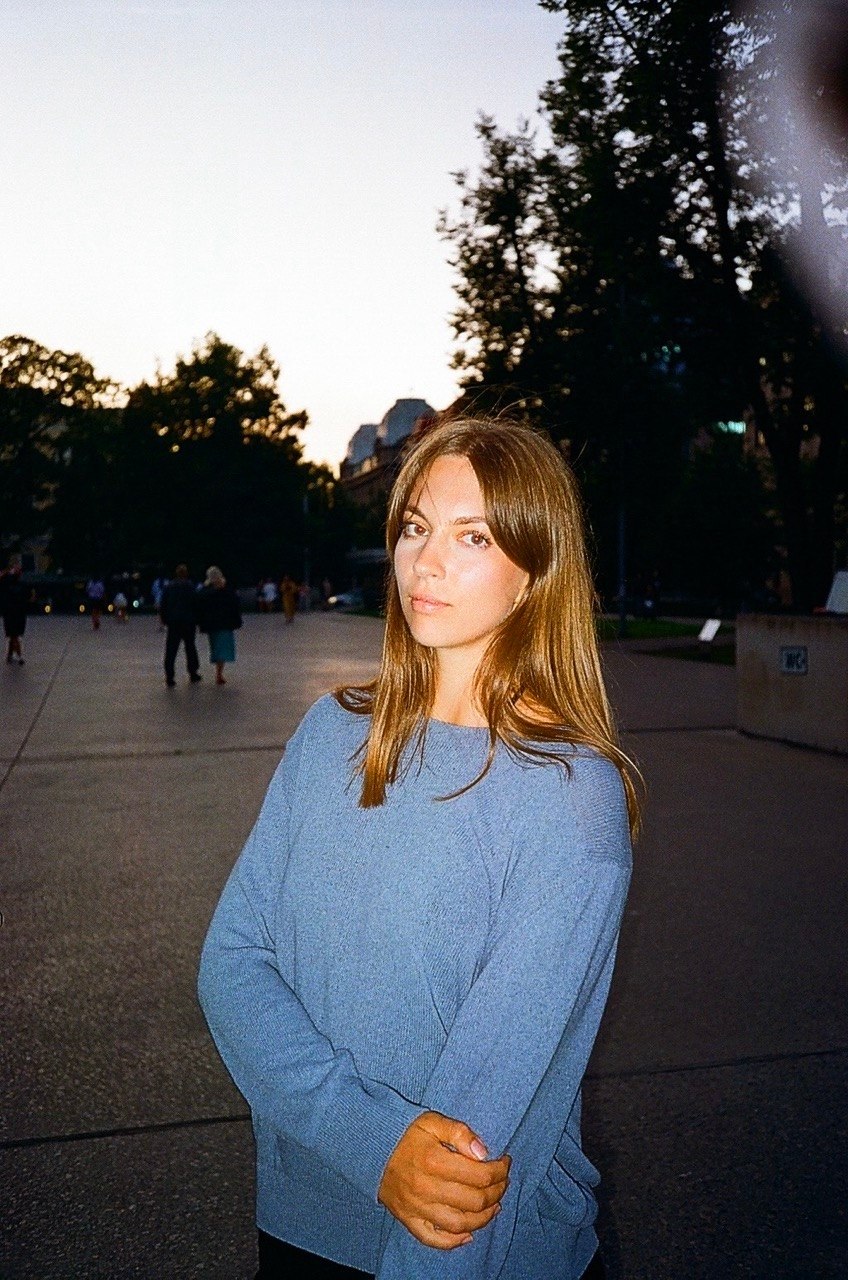 Portrait of Sonya Jurane wearing a blue sweater